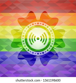 signal icon inside emblem on mosaic background with the colors of the LGBT flag