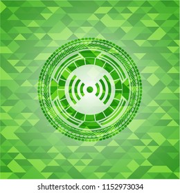 signal icon inside green emblem with mosaic background