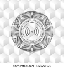 signal icon inside grey emblem with geometric cube white background