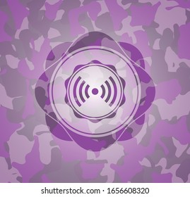 signal icon inside pink camouflage emblem