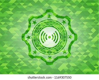 signal icon inside realistic green mosaic emblem