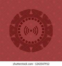 signal icon inside red emblem