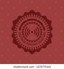 signal icon inside red emblem