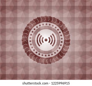 signal icon inside red seamless badge with geometric pattern background.