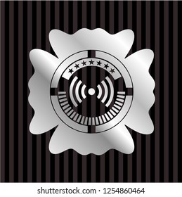 signal icon inside silver emblem or badge