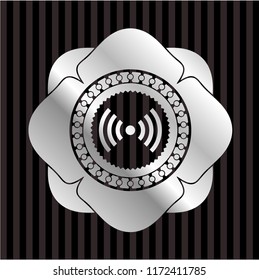 signal icon inside silvery badge or emblem