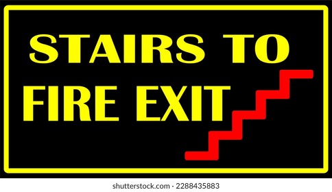 signboard with the words stairs to fire exit in the form of a black box with yellow writing
