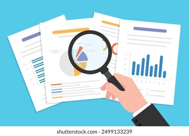 Signifying data analysis for informed business decisions, Hand holding a magnifying glass over data document sheet.