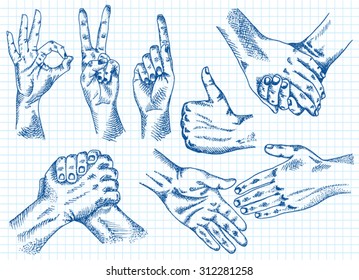 Signs hands. One hand making thumb up gesture. Hand is showing Like. Hands held together. Fist agreement. Shaking hands. Friendship. on the sheet of notebook background