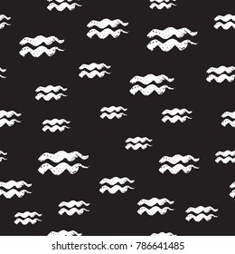 Signs of the zodiac. Aquarius symbol hand draw. White silhouette. Vector illustration isolated on a black background.