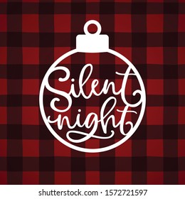 Silent night hand lettering. Christmas greeting card, invitation with white paper cut Christmas ornamnet and text over tartan, red checkered plaid. Winter vector calligraphy, buffalo background.