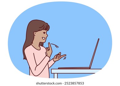 Silent teenage girl using laptop and sign language making video call to friends or school teacher for distance learning. Silent child gesturing standing near computer while learning to communicate