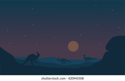 Silhoette of parasaurolophus at night with star and moon