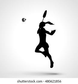 Silhouette of abstract female badminton player