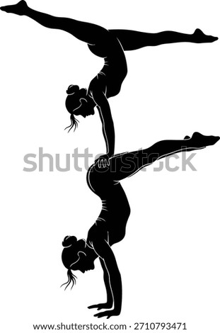 Silhouette of Acrobatic Duo Performing Handstand Balance with Extended Legs