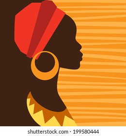 Silhouette of african girl in profile with earrings.