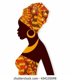 Silhouette of African girls in bright colored turban on her head in profile with earrings.