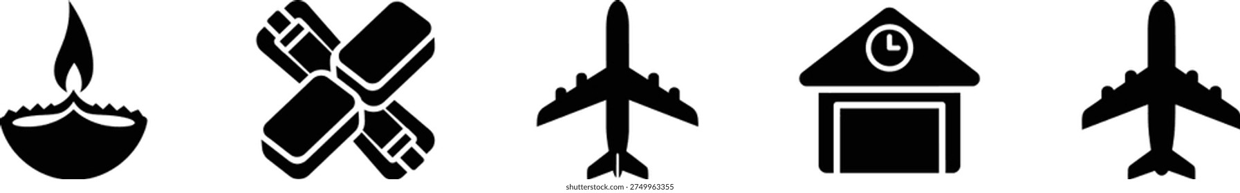 A silhouette of airplanes flying over a small airport at sunset