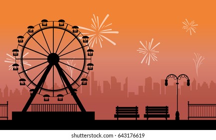 Silhouette amusement park with firework scenery