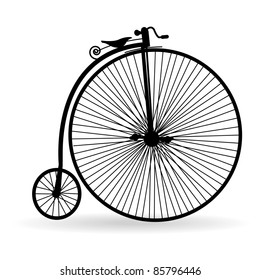 Silhouette of an ancient bicycle on a white background