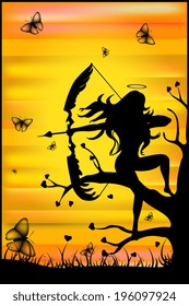 Silhouette of an angel with a bow on a background sunset 