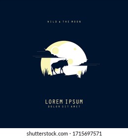 Silhouette of an animal standing on a hill. Full moon on the background.