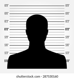 Silhouette of  anonymous man in mugshot or police lineup background