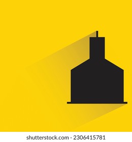 silhouette apartment building icon with shadow on yellow background