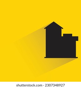 silhouette apartment building icon with shadow on yellow background