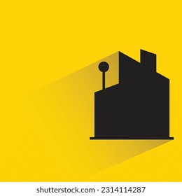 silhouette apartment building icon with shadow on yellow background