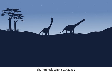 Silhouette of argentinosaurus on the hill