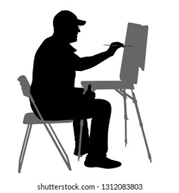 Silhouette, artist at work on a white background