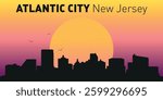 A silhouette of Atlantic City, New Jersey, against the backdrop of a picturesque sunset or sunrise.