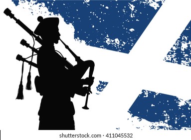 Silhouette of a bagpiper with Scottish flag on the background
