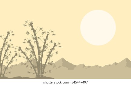 Silhouette of bamboo on mountain background