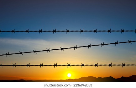 Silhouette de alambre de púas al fondo de la puesta del sol. Vector EPS10