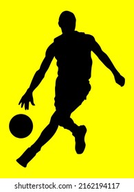 Silhouette of a basketball player in motion with the ball.