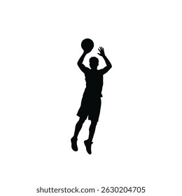 Silhouette of a basketball player shooting the ball during a game competition isolated