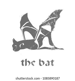 Silhouette of the bat. Halloween gray bat icon.  Vector grunge fashion design print the bat in gray.  Vector illustration EPS10.
