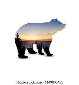Silhouette of bear with coniferous trees, sea horizon and colorful sky. 