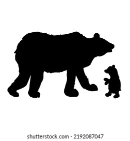 Silhouette of a bear with a cub.