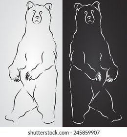 Silhouette of a  bear on the black and white backgrounds