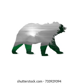 Silhouette of bear with pine forest, mountain landscape in green and grey tones.