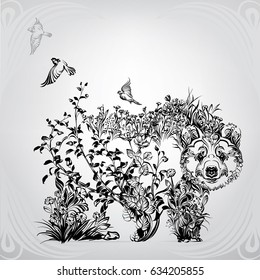 Silhouette of a bear from vegetation