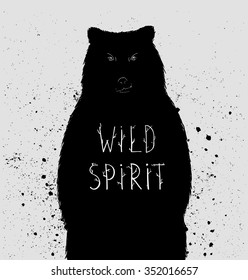 Silhouette of  bear with "wild spirit" lettering. Vector illustration