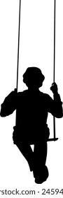 Silhouette a beautiful  boy swinging
