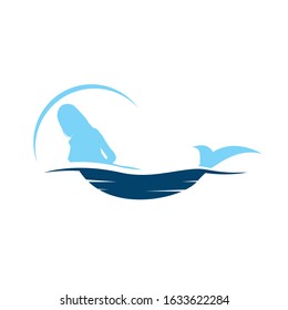 silhouette of beautiful mermaid logo with tail on the beach pose background