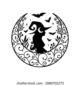 Silhouette of beautiful young witch with crescent moon decoration