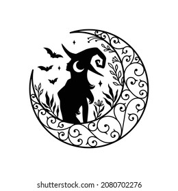 Silhouette of beautiful young witch with crescent moon decoration