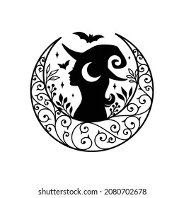 Silhouette of beautiful young witch with crescent moon decoration